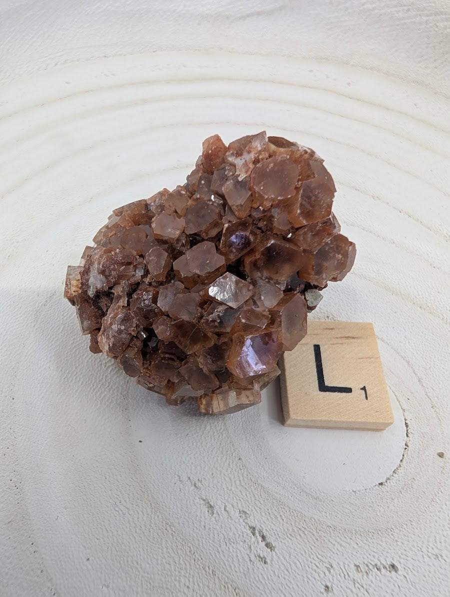 90g Moroccan Aragonite Star Cluster, all-natural reddish-brown crystals with vitreous luster.