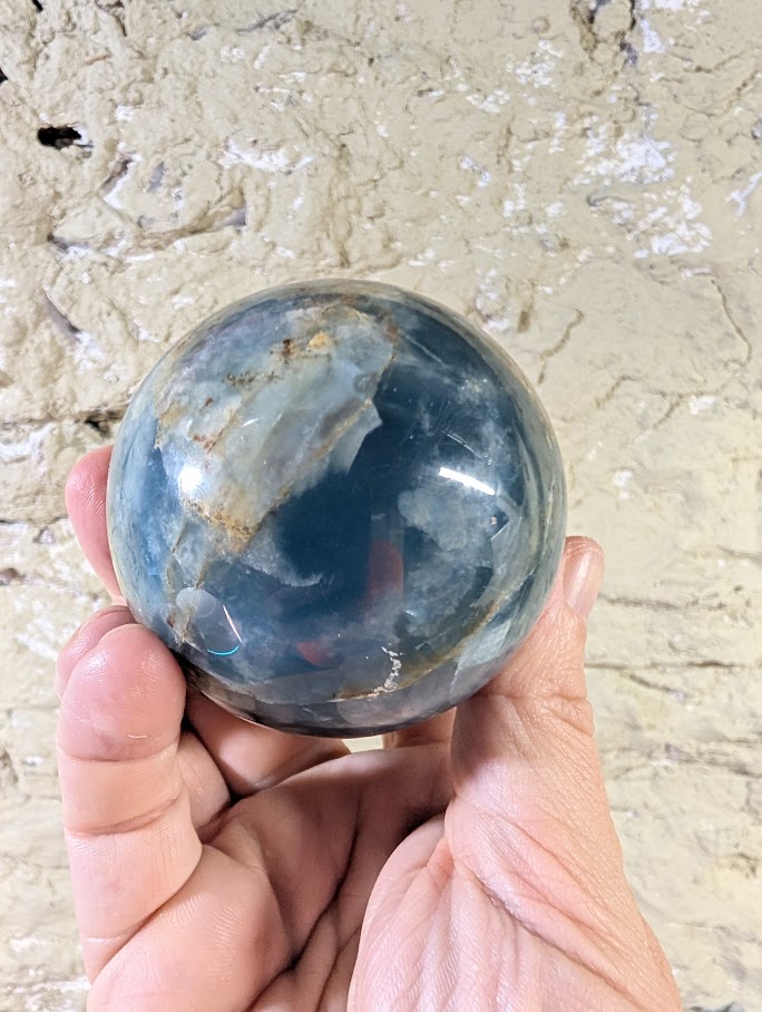 Top angle of polished blue calcite sphere from Argentina