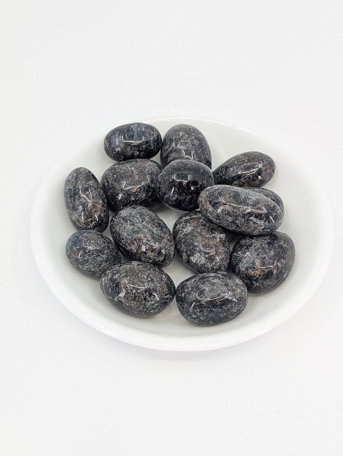 Astrophyllite with Mixed Garnet tumbled stones – A grade main product image