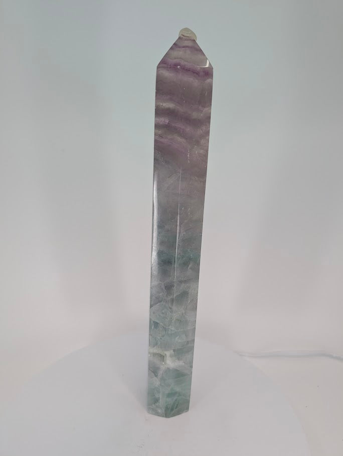 Banded Fluorite tower – angled side showing translucency