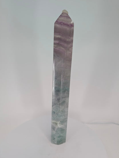 Banded Fluorite tower – angled side showing translucency