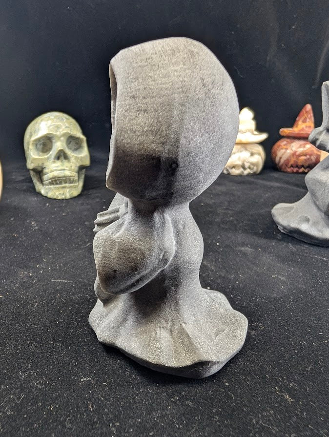 Black Obsidian Death carving faceless variant - angled view