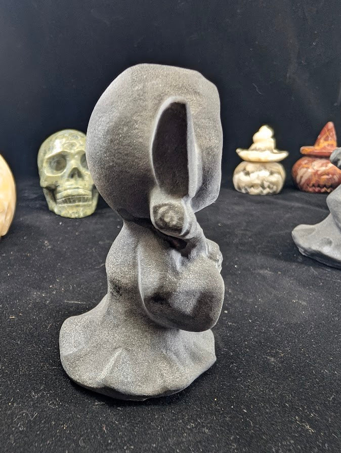 Black Obsidian Death carving faceless variant - side profile