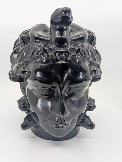 Front view of 2.08 kg black obsidian Medusa carving