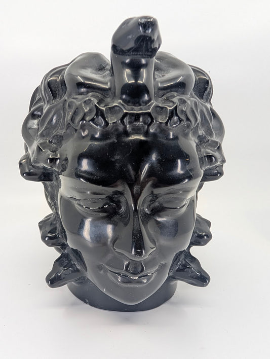 Front view of 2.08 kg black obsidian Medusa carving