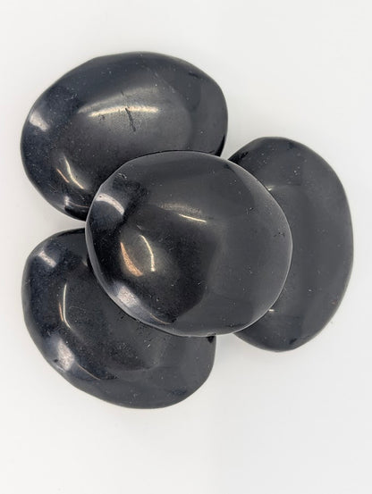 Black Obsidian Palm Stones top view showing polish