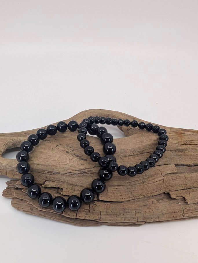 Natural polished Black Tourmaline bracelets in 6mm and 8mm bead sizes