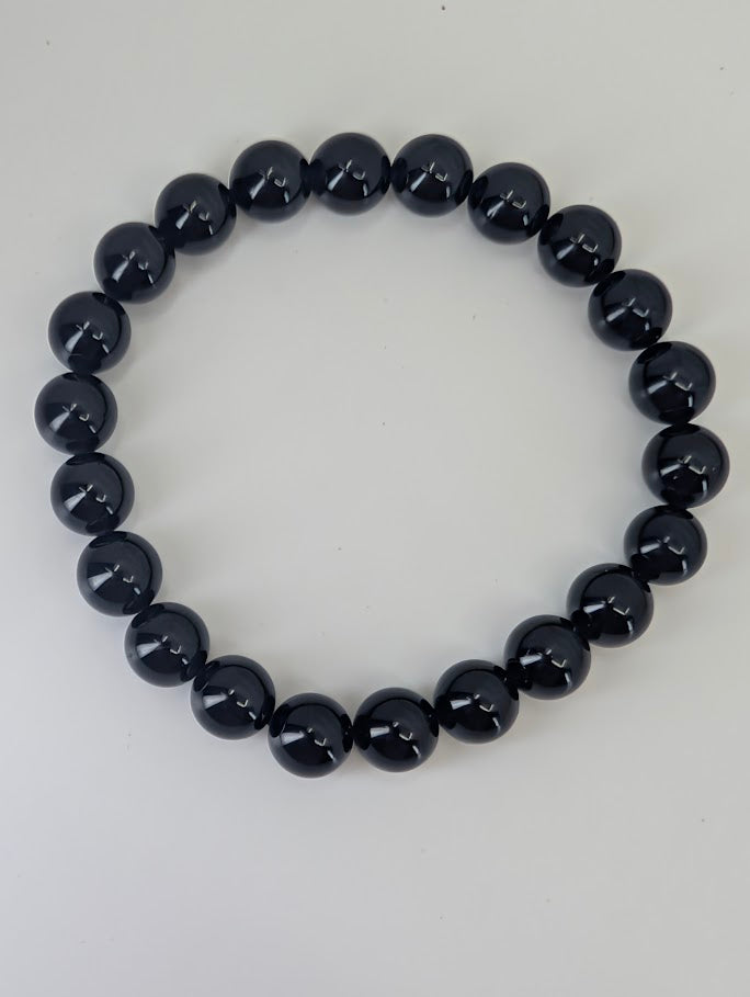 8mm Black Tourmaline bracelet with high polish and deep black luster