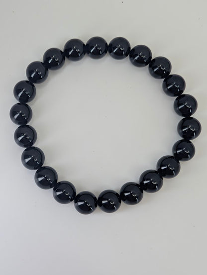 8mm Black Tourmaline bracelet with high polish and deep black luster