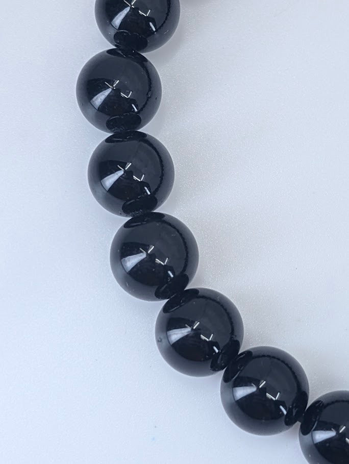 Detailed view of Black Tourmaline bracelet showing natural luster and texture