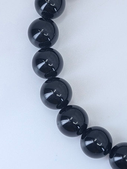 Detailed view of Black Tourmaline bracelet showing natural luster and texture