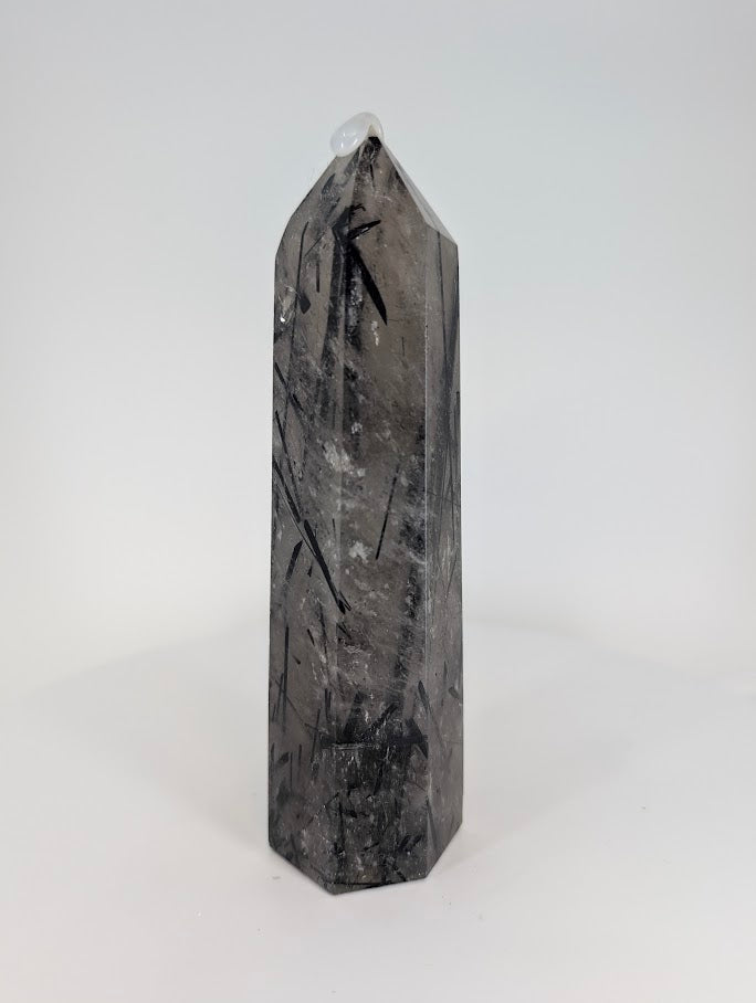 Polished Brazilian tourmalinated quartz – side profile