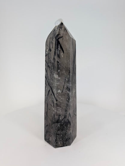Polished Brazilian tourmalinated quartz – side profile