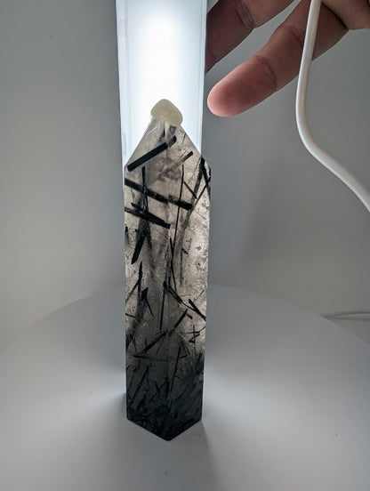 Black Tourmaline in Quartz tower under LED light