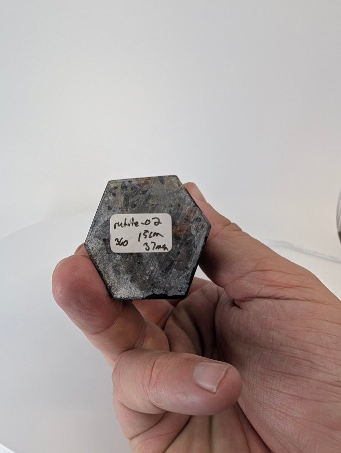 Label and polished base of Brazilian tourmalinated quartz tower