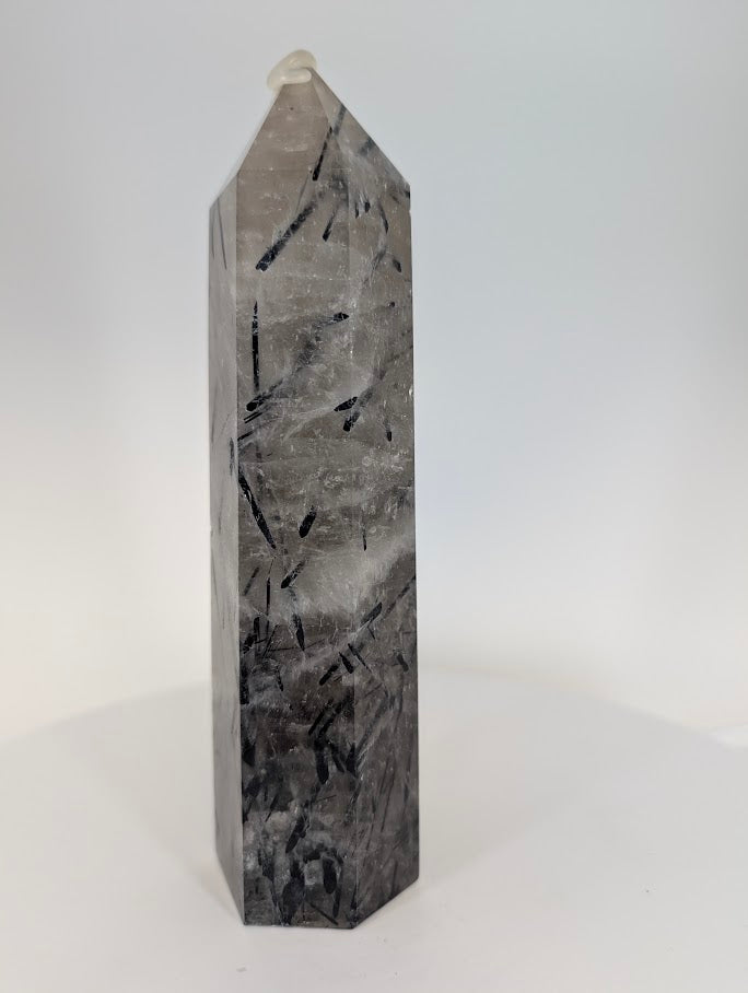 Polished Brazilian tourmalinated quartz tower – side profile