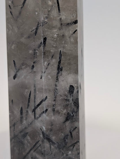 Tourmalinated quartz with clear body and black inclusions