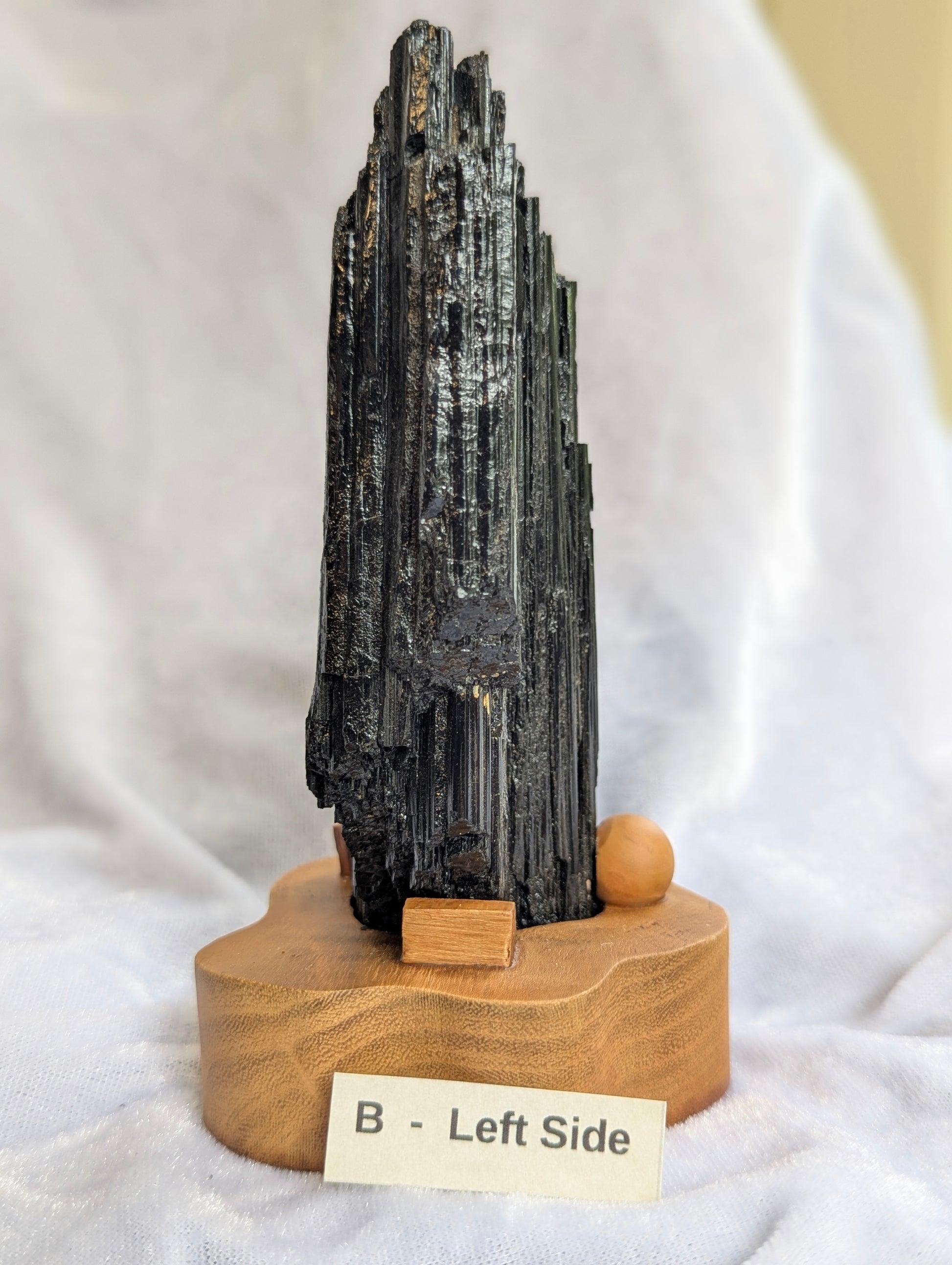 Left Side profile of 435g raw Black Tourmaline tower displaying natural crystal habit.