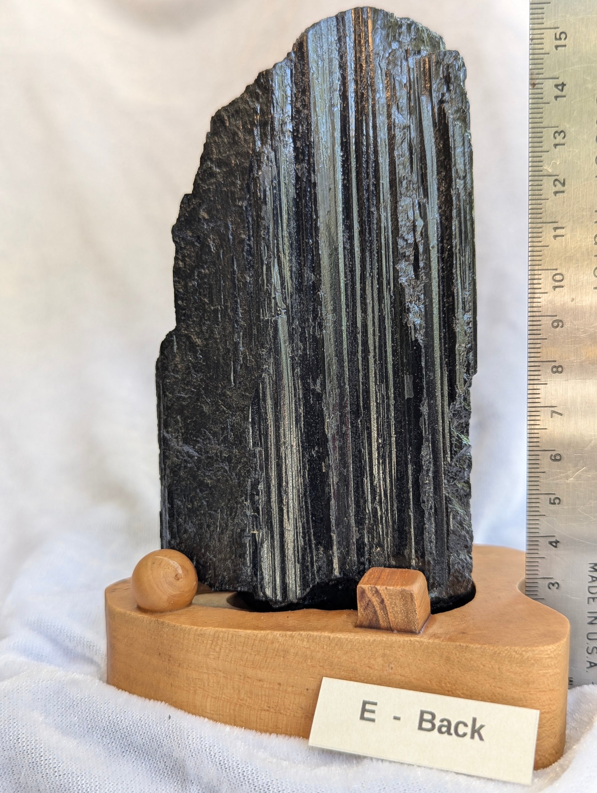 Custom base detail for 700g raw Black Tourmaline tower.