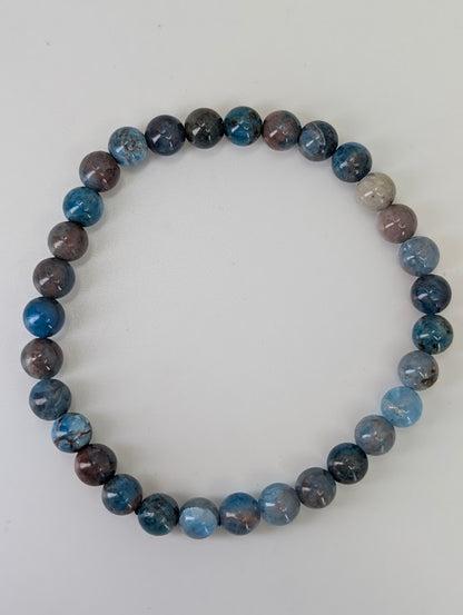 5 mm round Blue Apatite bracelet with vivid deep blue and natural matrix patterning