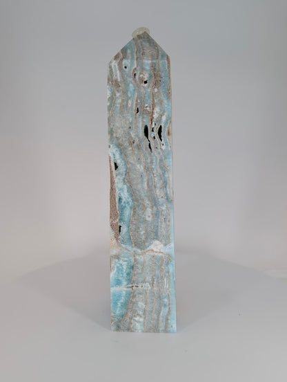 Blue Aragonite (Caribbean Calcite) Tower – alternate side showing natural cavities and polished finish