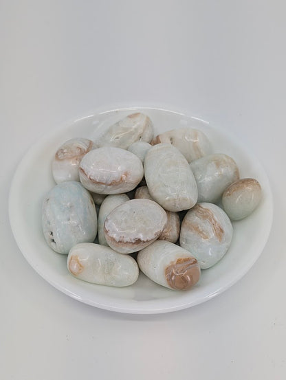 Blue Aragonite tumbled stones from Peru