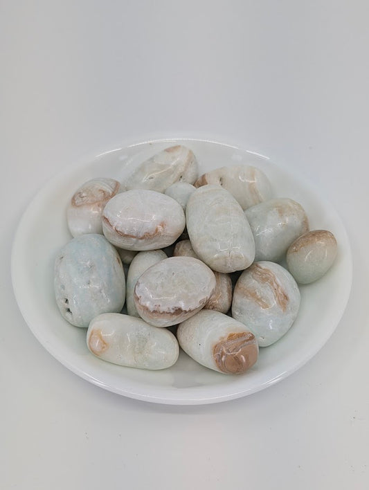 Blue Aragonite tumbled stones from Peru