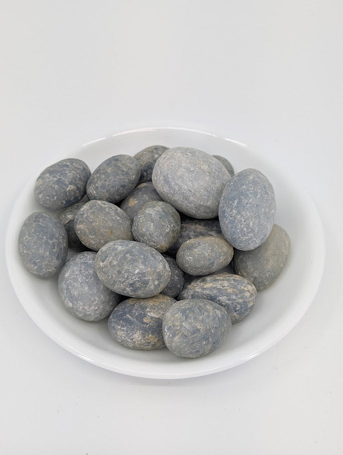 Blue Calcite tumbled stones A grade in bowl