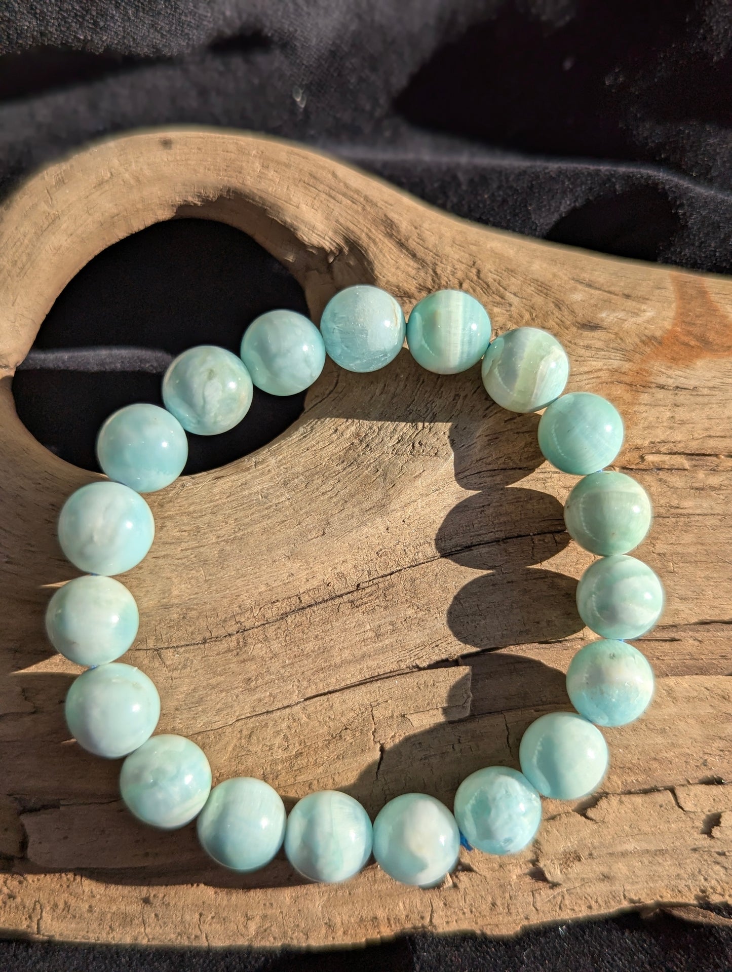 An oversized 10mm statement stretch bracelet made from 19 premium Blue Hemimorphite beads, highlighting rich sky-blue mineral saturation.