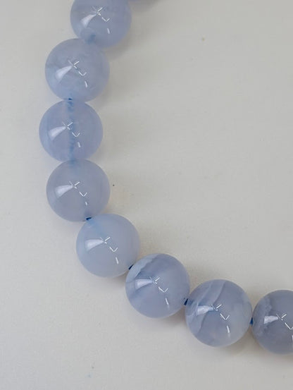 Closeup of 8mm blue lace agate bracelet