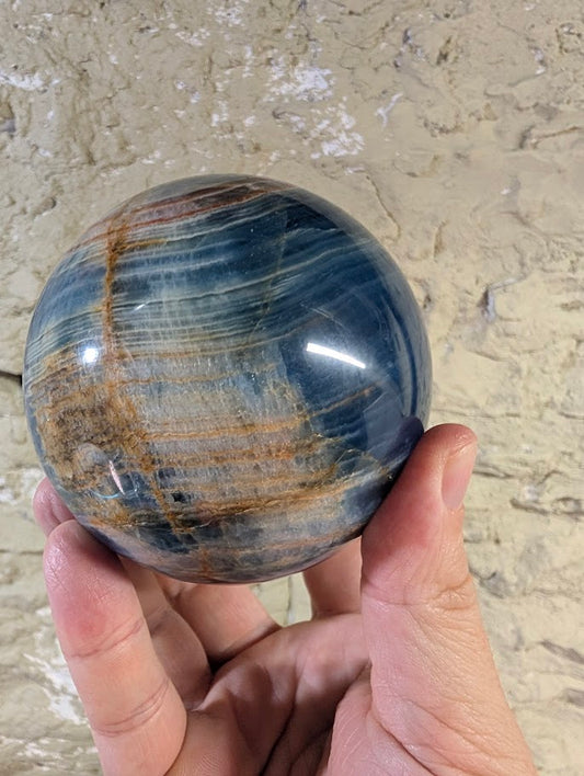 blue-onyx-sphere-90mm-crossband-front