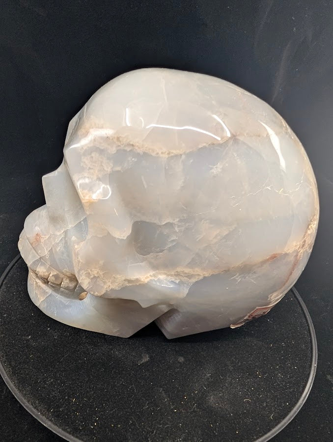 Right side profile highlighting internal veils and banding in Blue Rose Quartz