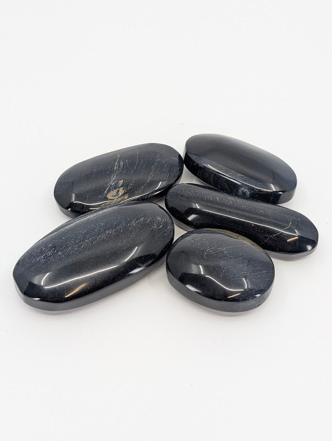 Group of Blue Tiger Eye Palm Stones showing dark blue sheen