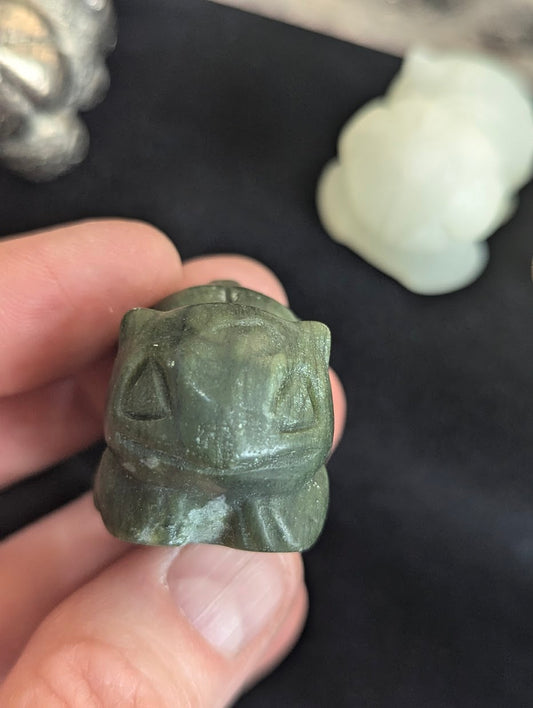 Detailed front view of a 3cm Bulbasaur carved from natural Green Jasper.