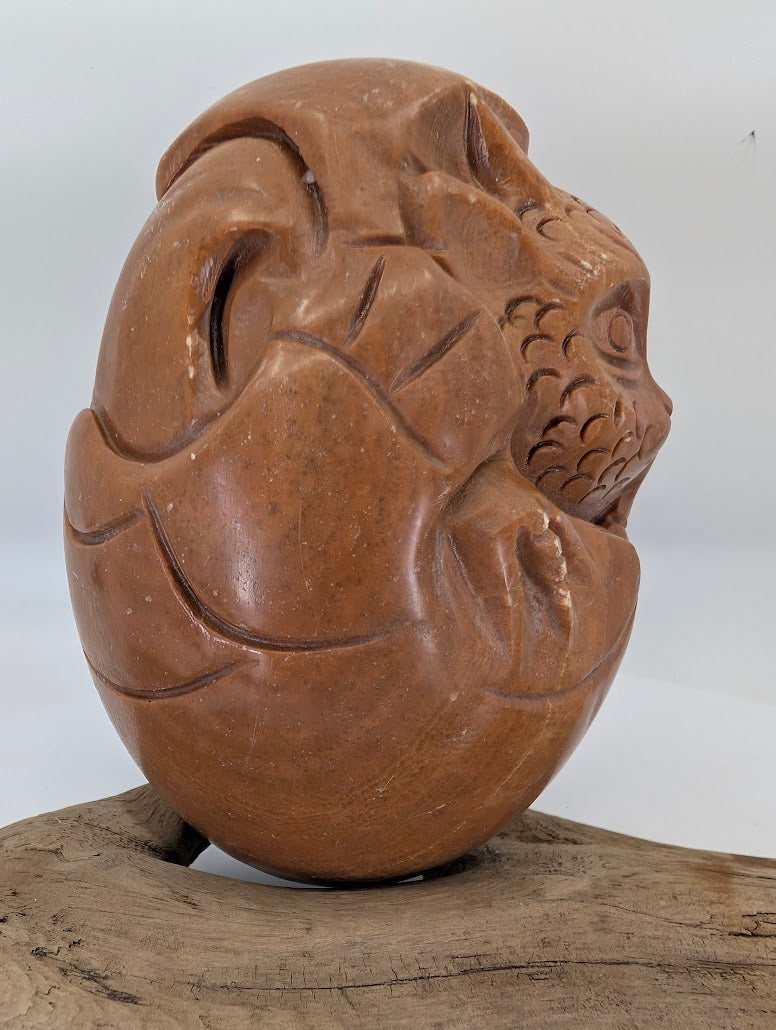 Side view of the Caramel Shoushan Dragon emphasizing the "soapy" tactile quality of the pyrophyllite.