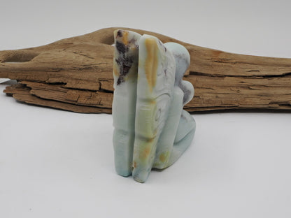 Back view of a Caribbean Calcite butterfly fairy carving showing the detailed wing etchings.