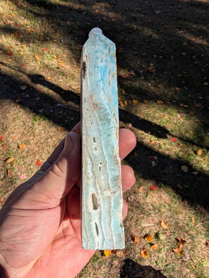 Caribbean Calcite Tower #2 front view – slim polished tower with blue calcite and aragonite from Pakistan