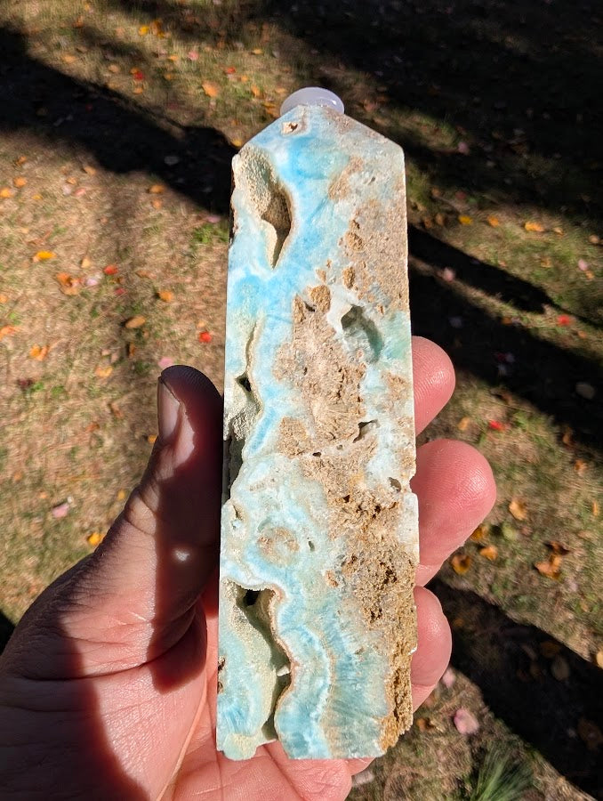 Caribbean Calcite Tower #3 front view — aqua-blue calcite with tan aragonite and bold natural cavities (Pakistan)