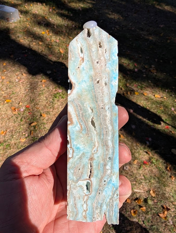 Caribbean Calcite Tower #4 front view — aqua-blue calcite with tan aragonite and natural cavities