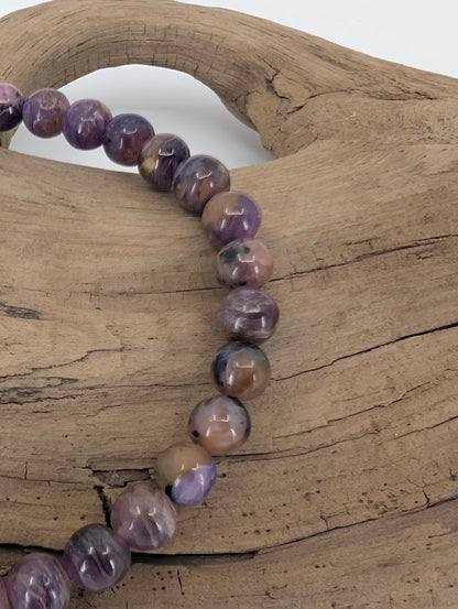 Closeup of 6mm charoite bracelet