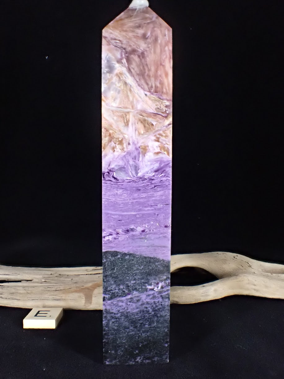 Detail view of the solid black Aegirine base on Tower E.