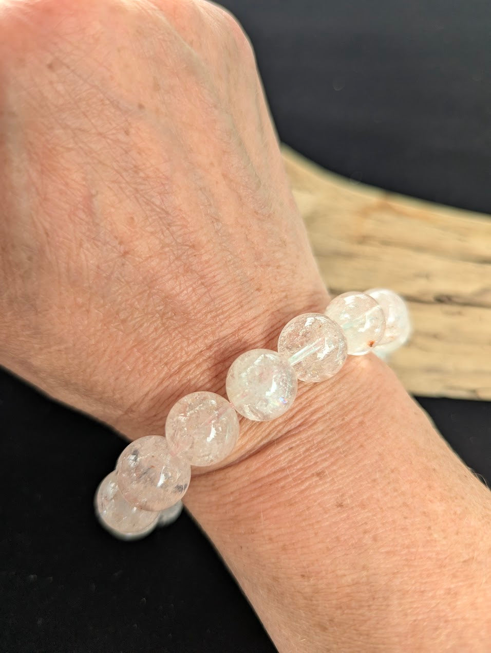 13mm AAA Grade Brazilian Cherry Blossom Garden Quartz beaded stretch bracelet worn on a wrist.