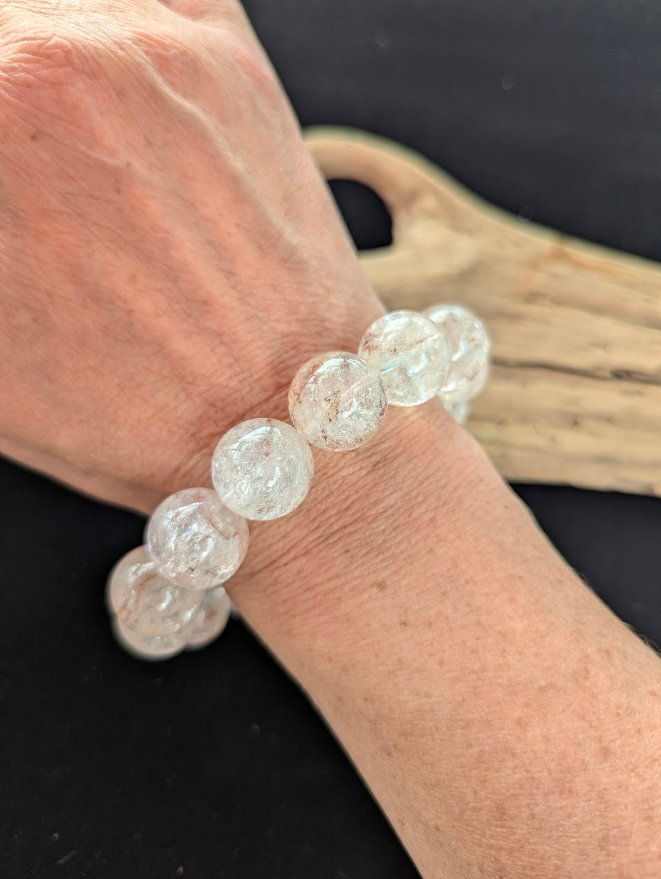 16mm AAA Grade Brazilian Cherry Blossom Garden Quartz beaded stretch bracelet worn on a wrist in natural lighting.