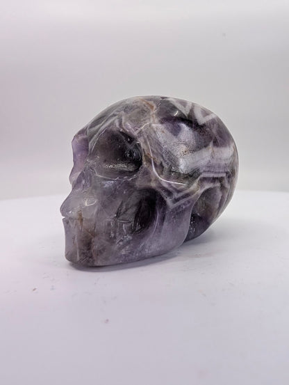 Chevron Amethyst crystal skull carving – 41mm hand-carved natural stone – Legacy Crystals and Minerals