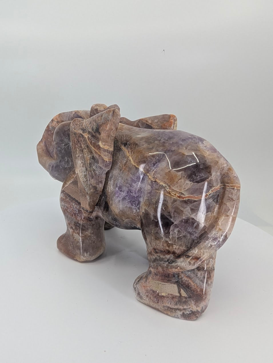 Chevron Amethyst elephant carving, back view showing banding