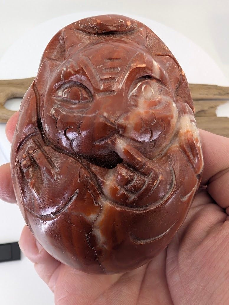 Macro frontal view of the Chicken-blood Dragon, a legacy investment piece for mineral collectors.