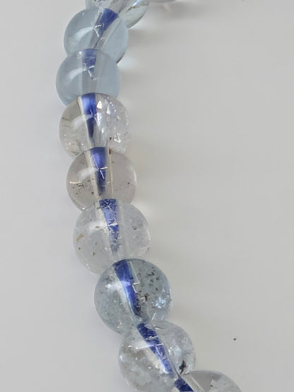 Detailed view of aquamarine bead structure and inclusions