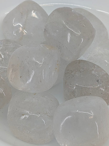 Close-up of Clear Quartz tumbled stones showing internal inclusions