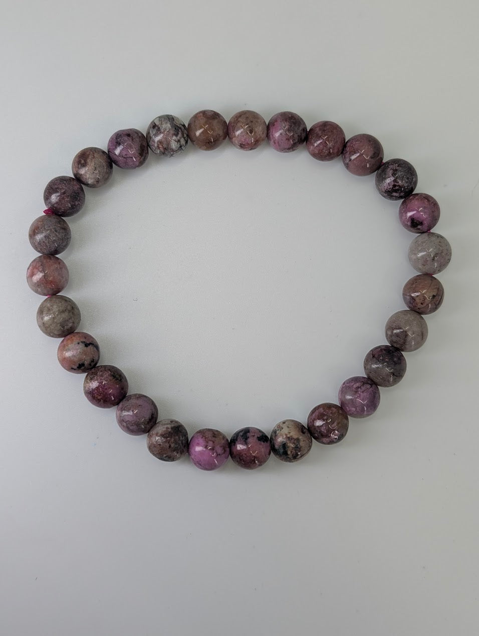 Cobaltoan Calcite bracelet on a white background