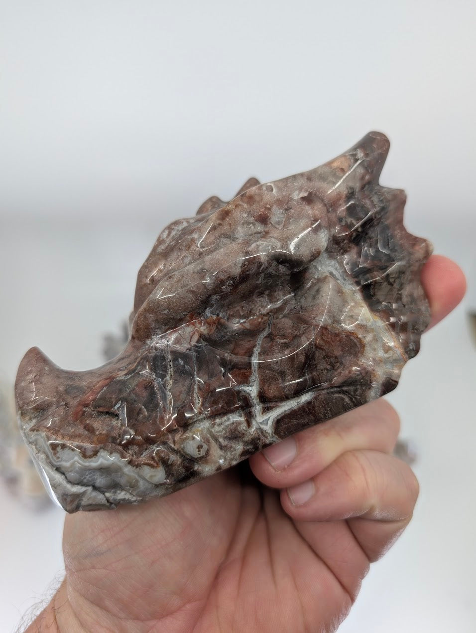 angled view of Variant E showing dramatic lace patterns and texture